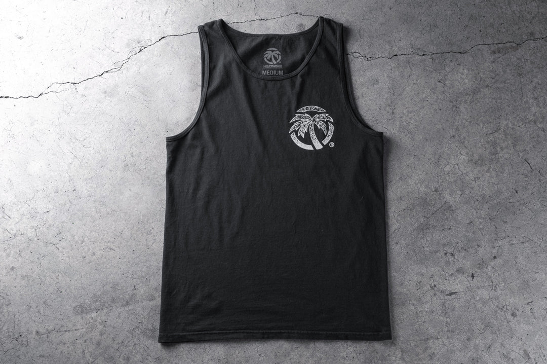 Frontside shot of the Heat Wave Alloy Tank Top on a concrete floor.