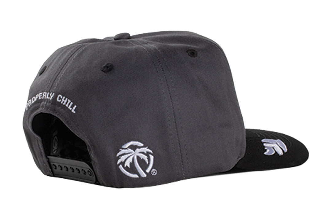 Back side angle of the Heat Wave x 805 Properly Chill Hat - Grey on a white background