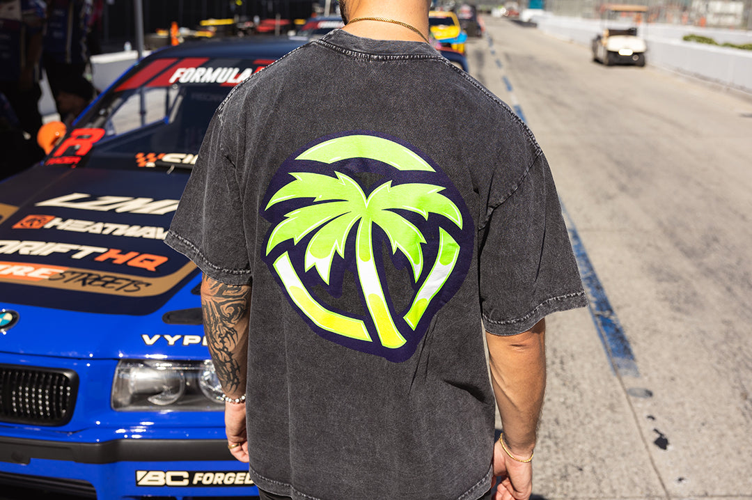 Man wearing the Heat Wave Antifreeze T-Shirt showing the backside.