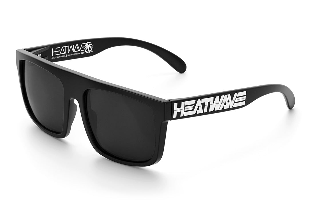 Heat Wave Visual Regulator Sunglasses with black frame, white billboard logo print arms and black lenses.