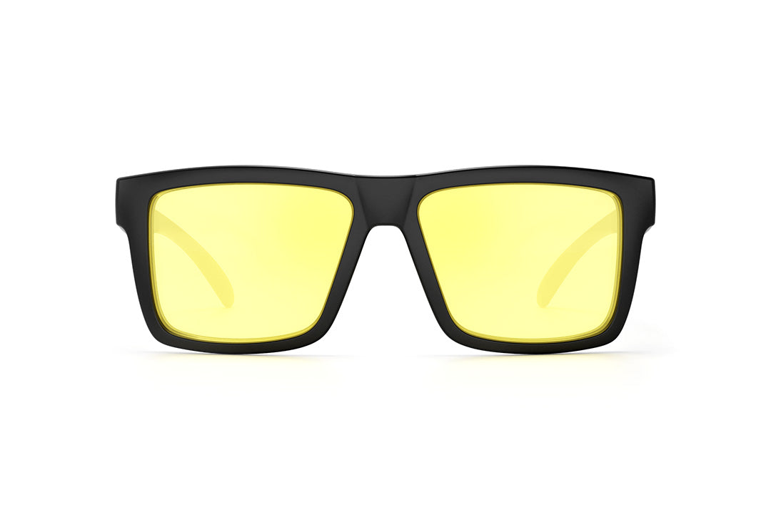 Front of Heat Wave Visual Vise Sunglasses with black frame, hi-vis yellow lenses and extra set of clear lenses.