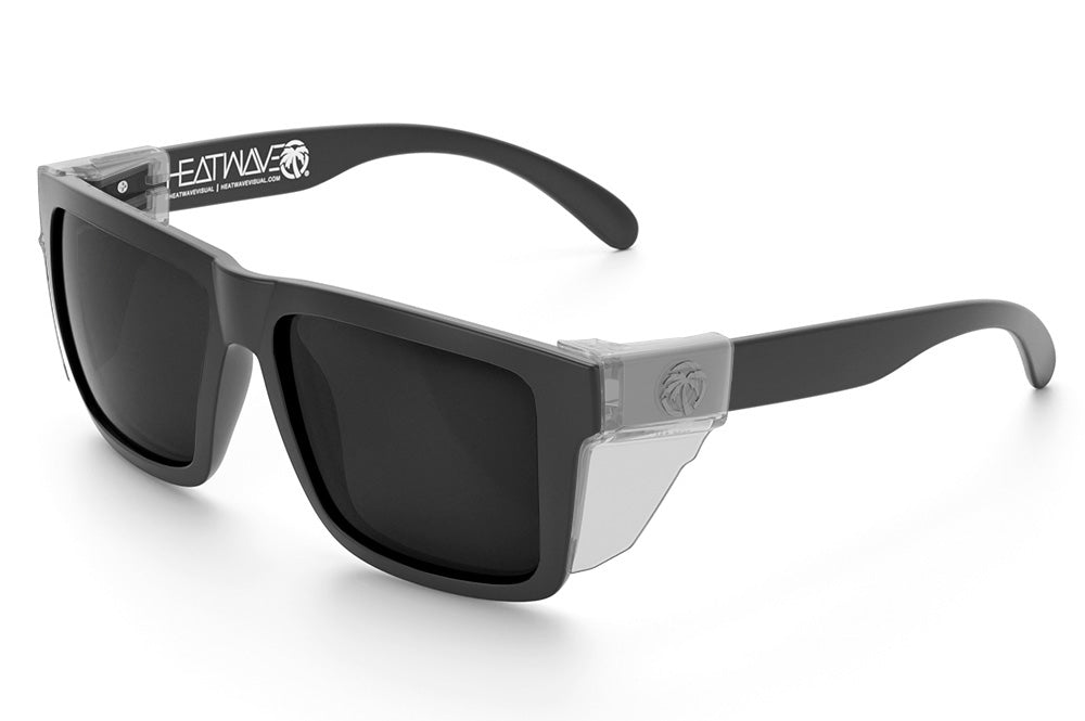 Heat Wave Visual XL Vise Z87 Sunglasses with rubberized frame, black lenses and clear side shields.