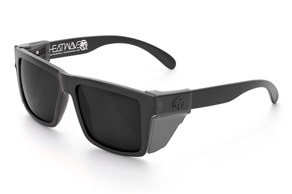 Heat Wave Visual Vise Z87 Sunglasses with rubberized frame, black lenses and smoke side shields.