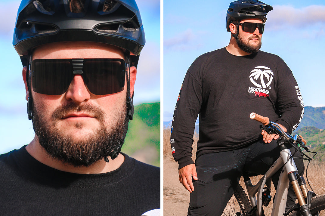 Mountain Biker wearing the Heat Wave Visual XL Vector Sunglasses with black frame and black lens.