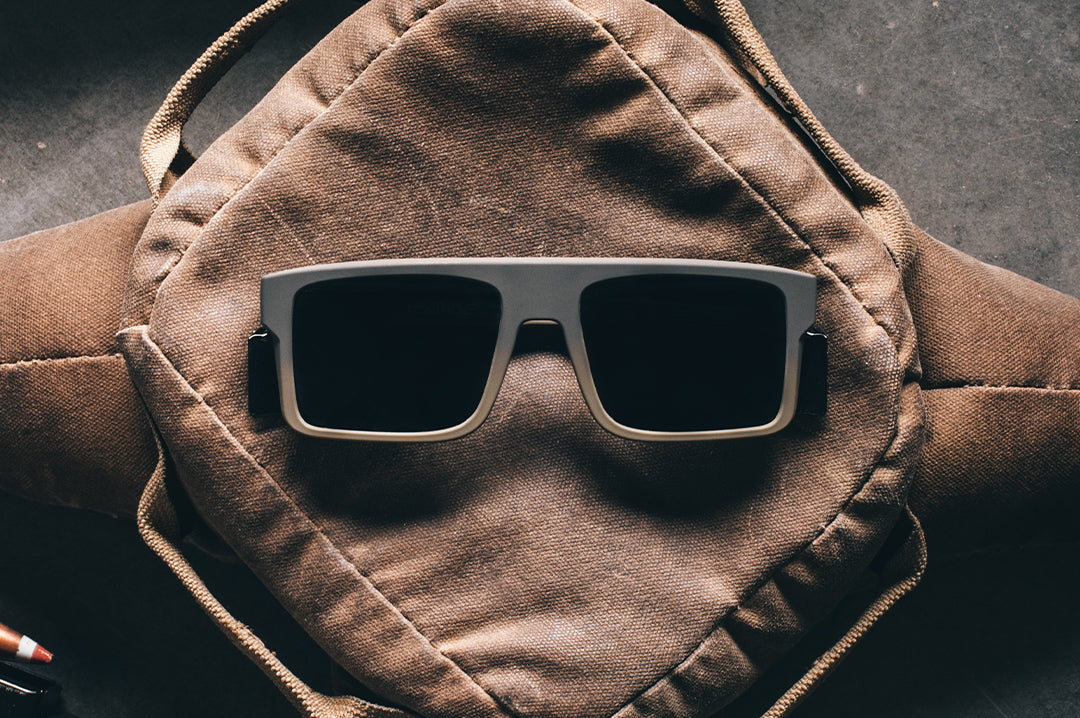 Front side of the Performance Rayth Sunglasses: FDE Fader Z87+ on a brown bag