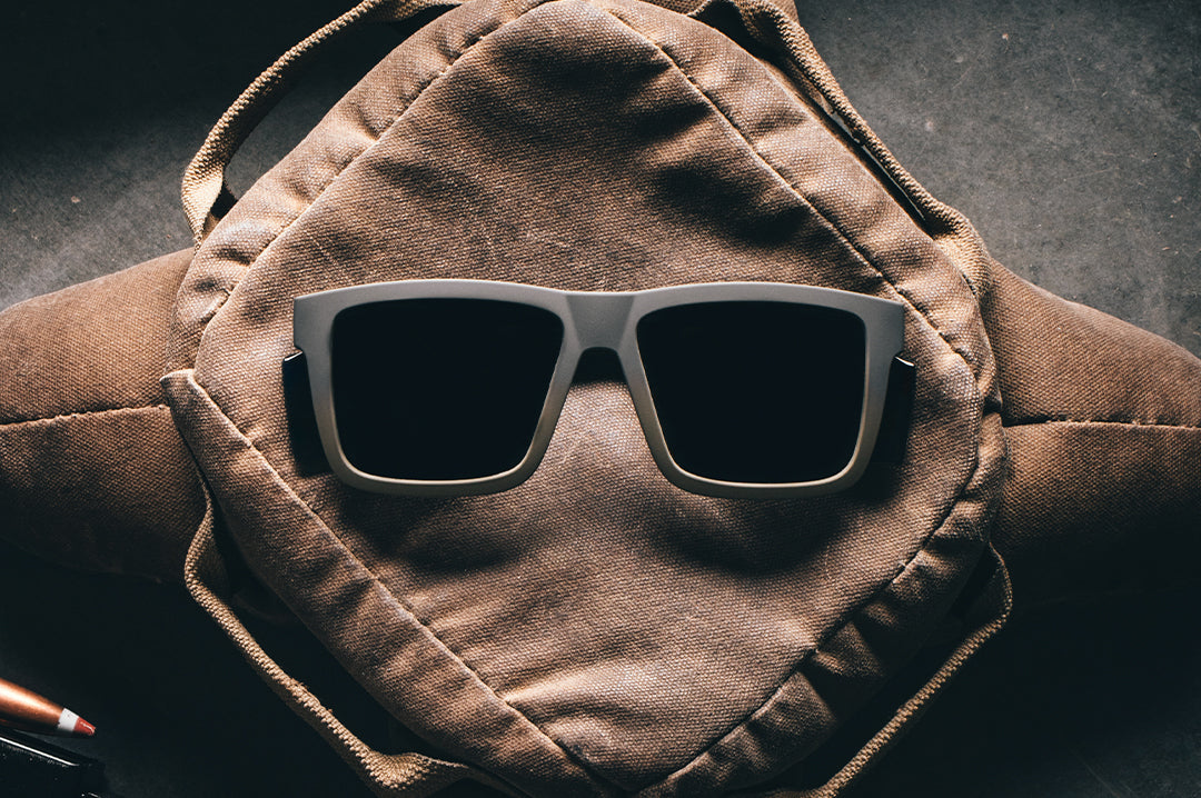 The Performance Vise Sunglasses: FDE Fader Z87+ on a brown bag