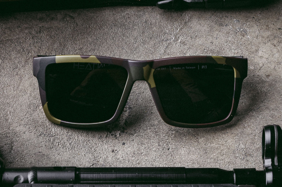 Close up of Heat Wave Visual Vise Z87 Sunglasses with fleck camo frame