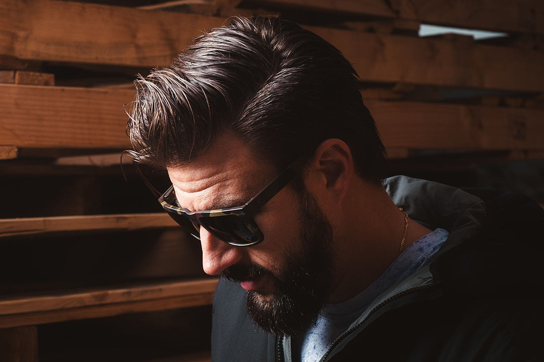 Heat Wave Visual Vise Z87 Sunglasses with fleck camo frame on model