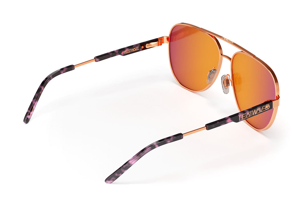Back view of the Heat Wave Visual Incline Sunglasses with rose gold frame and rose gold lenses.