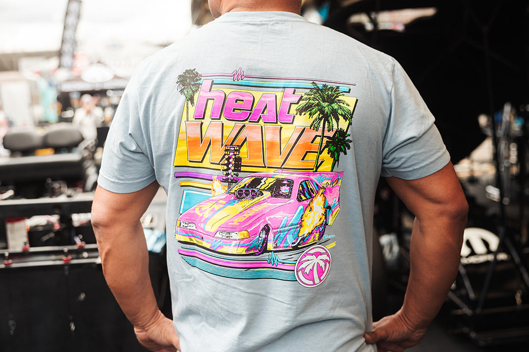 Man showing the back side of the Heat Wave Zoomies T-Shirt