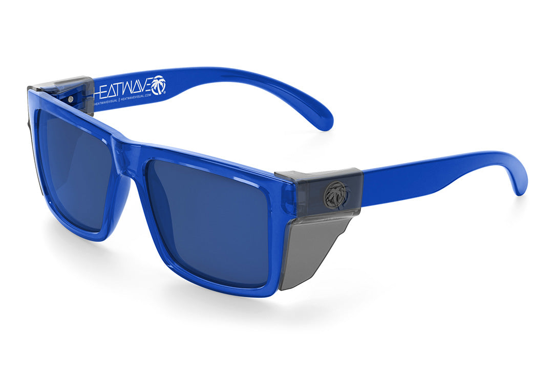 Heat Wave Visual Vise Z87 Sunglasses with neon blue frame, coastal blue lenses and smoke side shields.