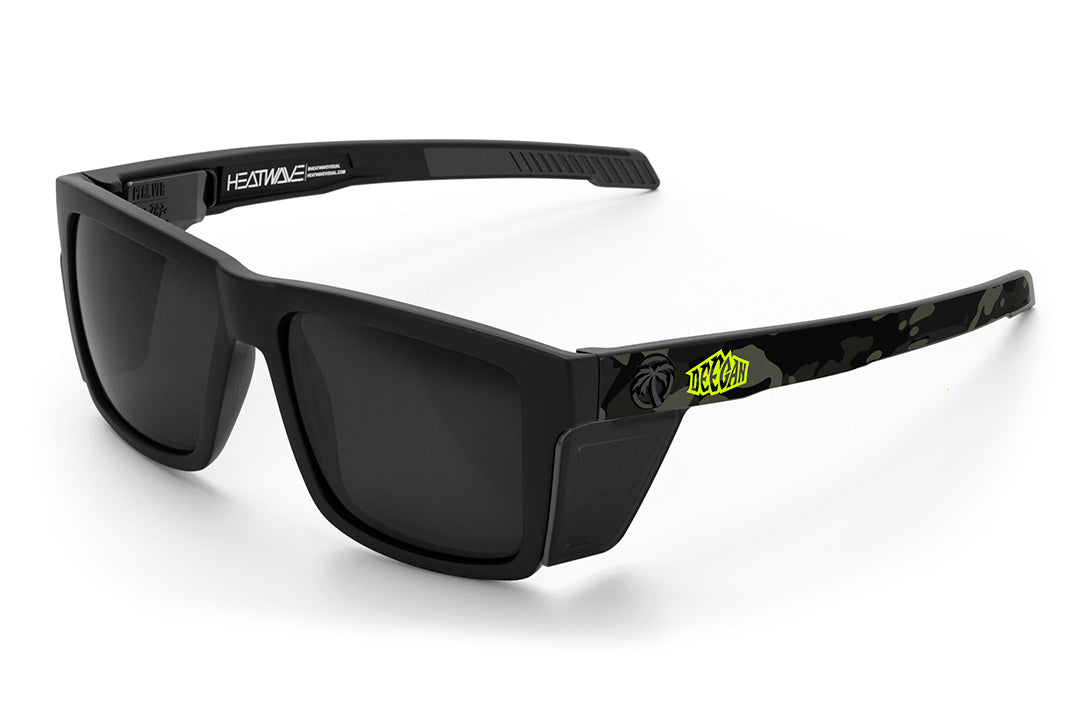 Heat Wave Visual Performance Vise Sunglasses with black frame, Deegan print arms, black lenses and matching side shields.