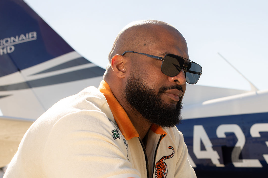 Ryan rocking the Heat Wave Visual Nimitz Sunglasses with satin black frame and ultra black lenses.