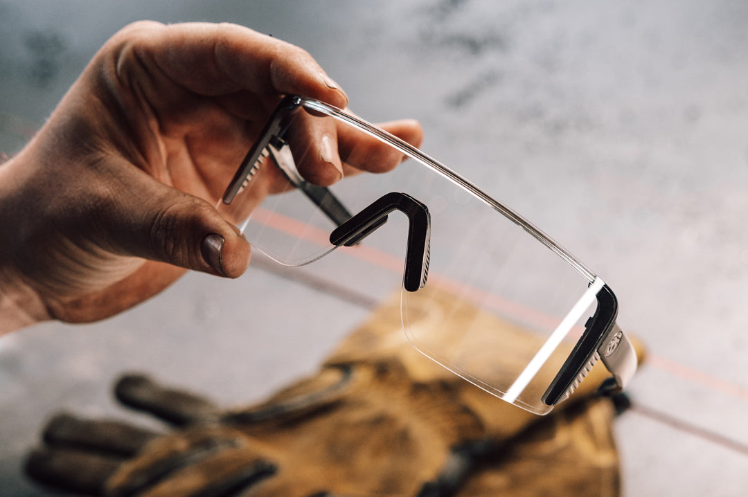 Hand holding the Skynet Sunglasses: Anti-Fog Z87+