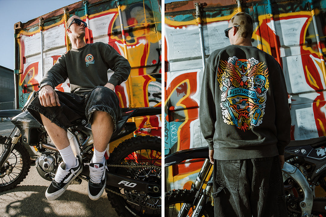 Man wearing the Heat Wave x Tall Boy Flash Crewneck Sweatshirt - Black showing front and backside