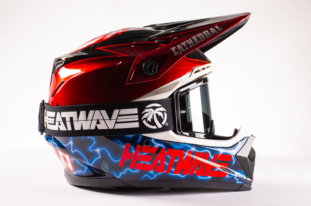 Heat Wave Visual MXG 250 Motosport Goggle on a motorcycle helmet.