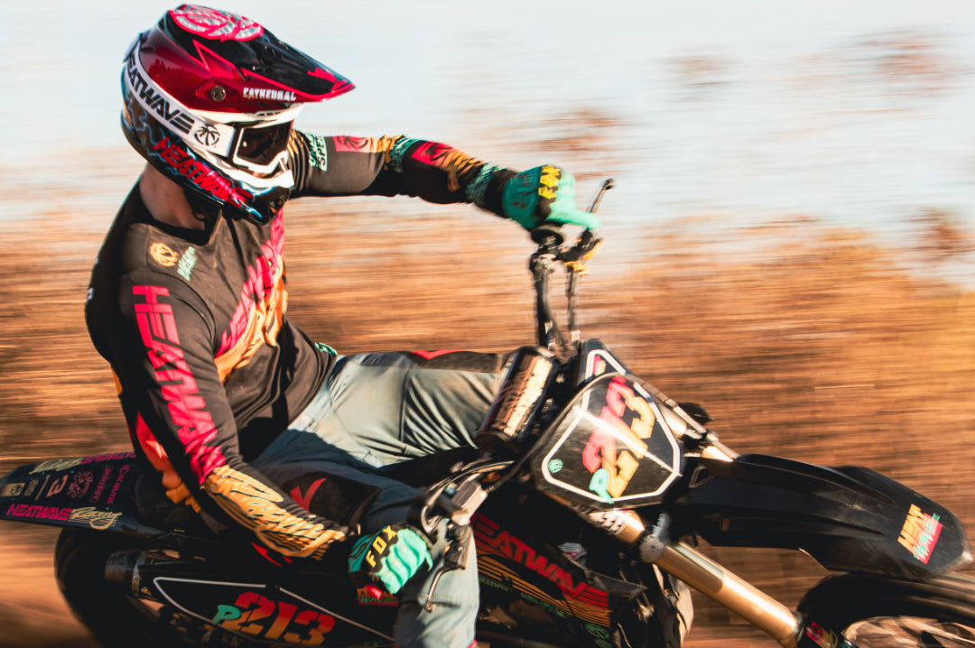 Dirt biker action shot wearing the Heat Wave Visual MXG-250 Motosport Goggle.