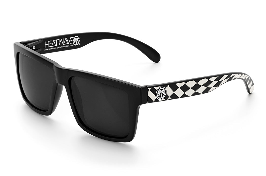 Heat Wave Visual Vise Sunglasses with black frame, Checkers print arms and black lenses. 