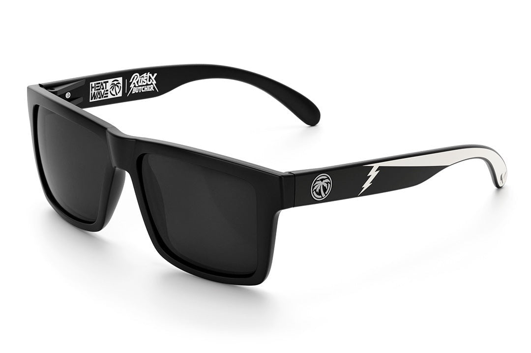 Heat Wave Visual Vise Sunglasses with black frame, rusty butcher print arms and black lenses.