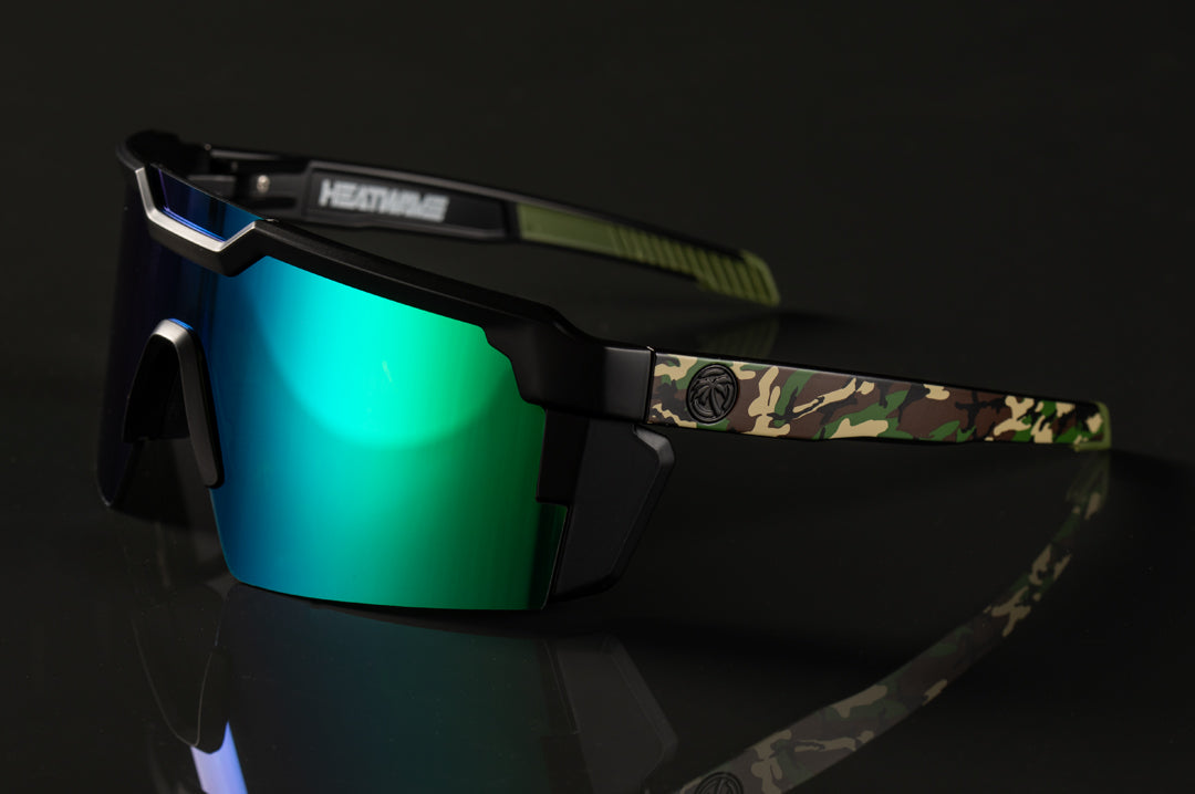 Side of Heat Wave Visual Future Tech Sunglasses with black frame, camo print arms and piff green lens.