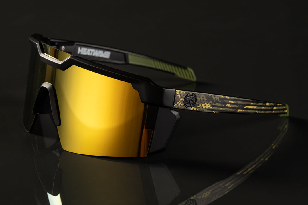 Side of Heat Wave Visual Future Tech Sunglasses with black frame with camo print arms and gold lens.