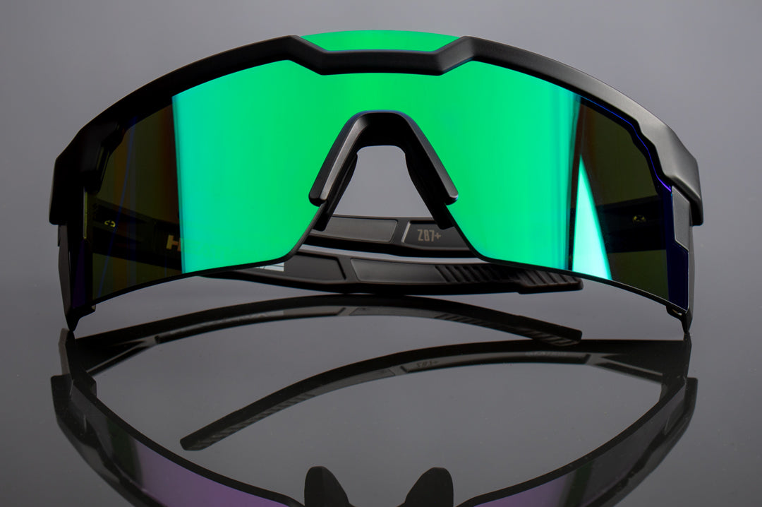 Front of Heat Wave Visual Future Tech Sunglasses with black frame and piff green lens.