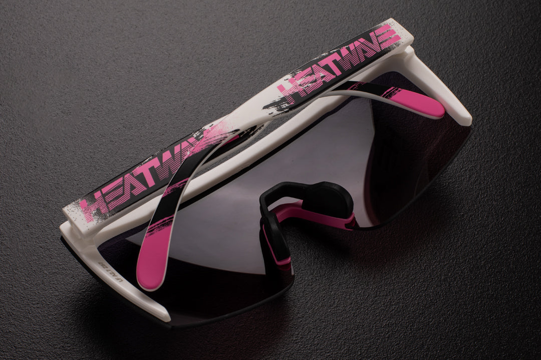 Back view of Heat Wave Visual Lazer face Z87 Sunglasses with white frame, reactive print arms and rose gold lens.