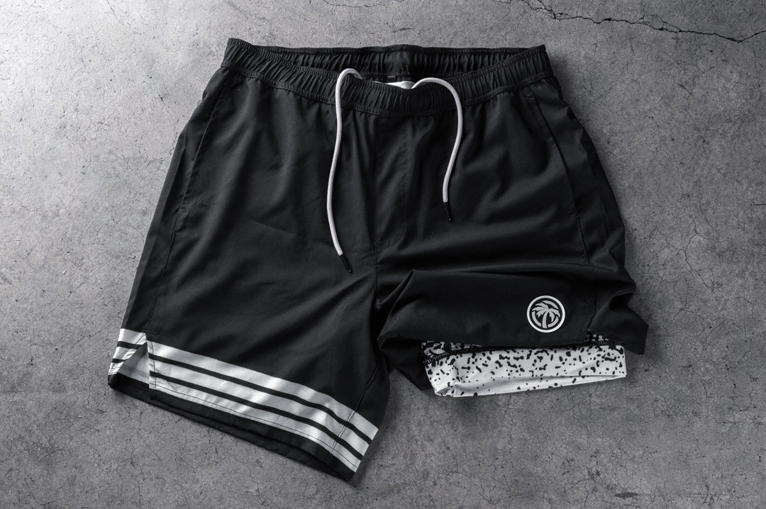 Frontside shot of the Heat Wave Alloy Performance Shorts on a concrete floor.