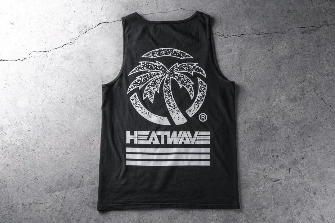 Backside shot of the Heat Wave Alloy Tank Top on a concrete floor.