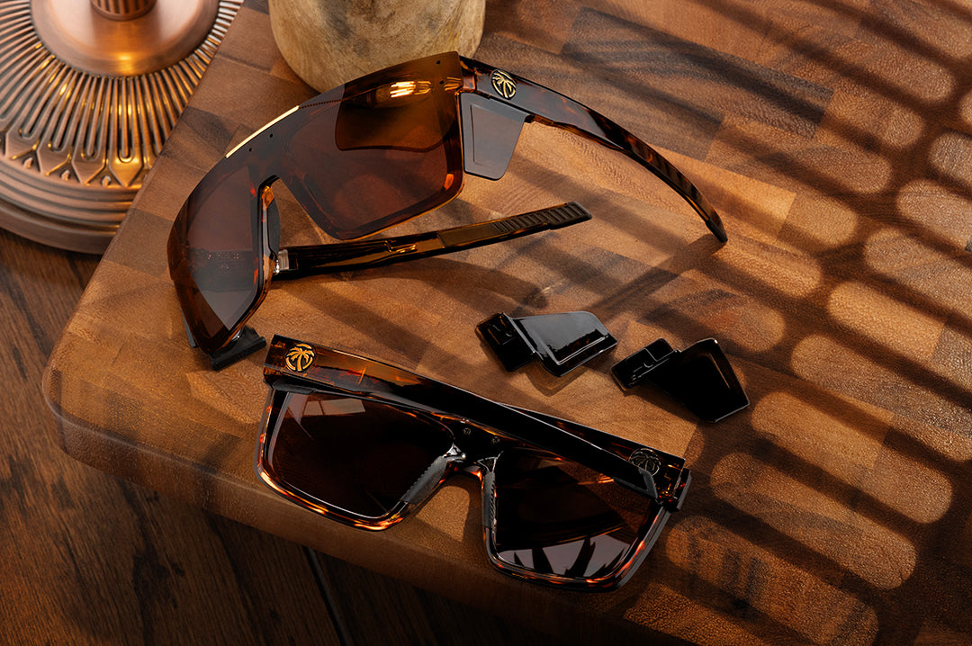 Heat Wave Z87+ Performance Quatro Tortoise sunglasses with removable side shields on wooden table.