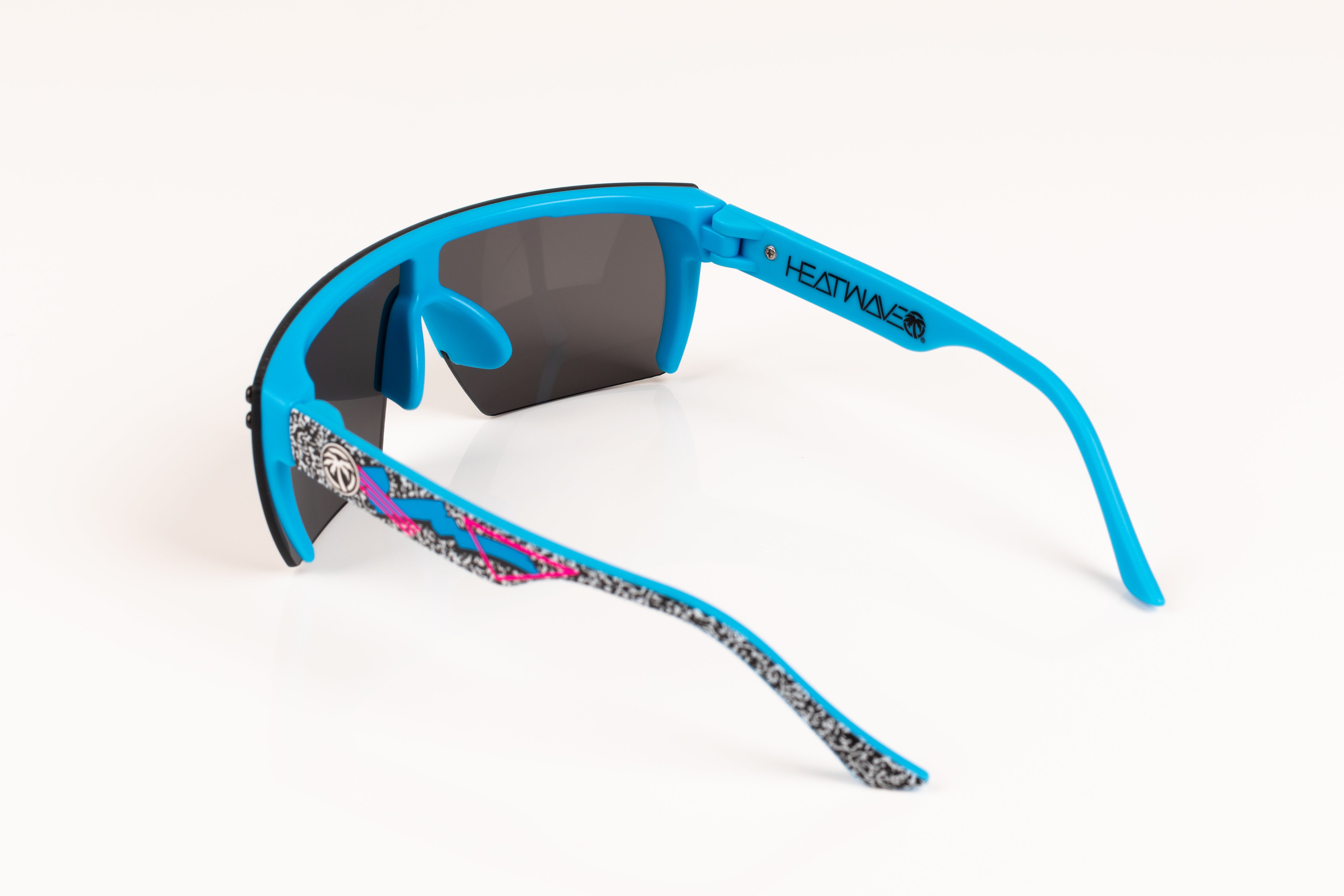 Back of Heat Wave Visual Lazer Face kids sunglasses blue frame, static print arms and black lens.