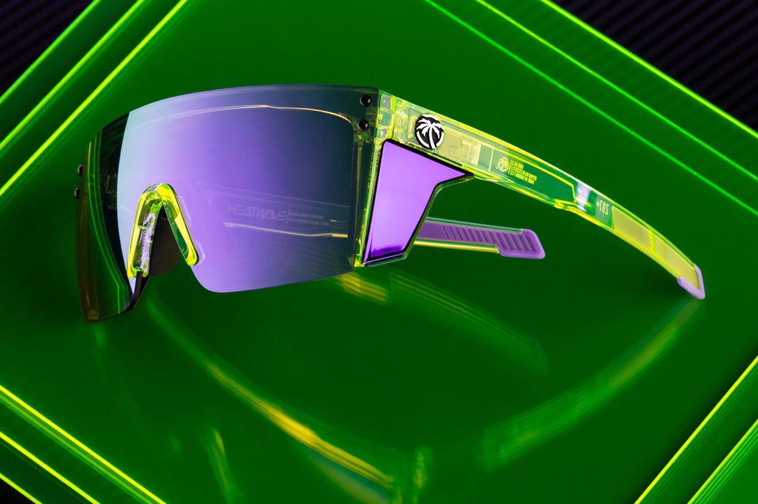 3/4th angle shot of the Performance Lazer Face Sunglasses: Antifreeze Z87+ on a neon green platform