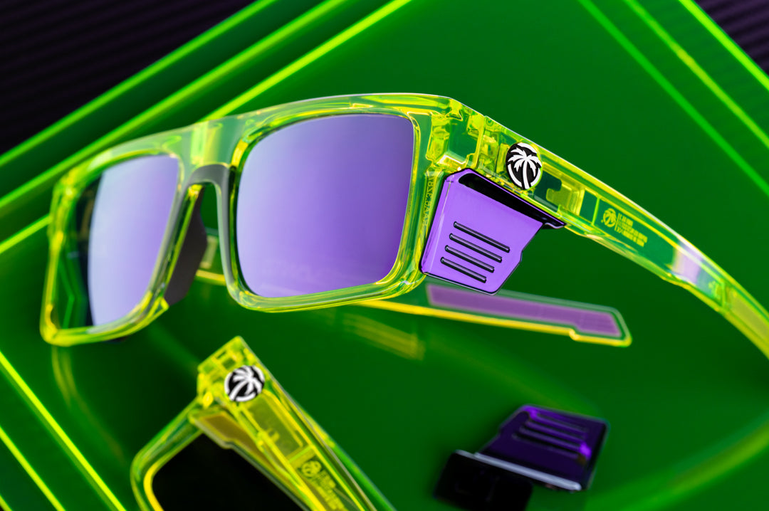 Close up shot of the Performance Rayth Sunglasses: Antifreeze Z87+ on a neon green platform