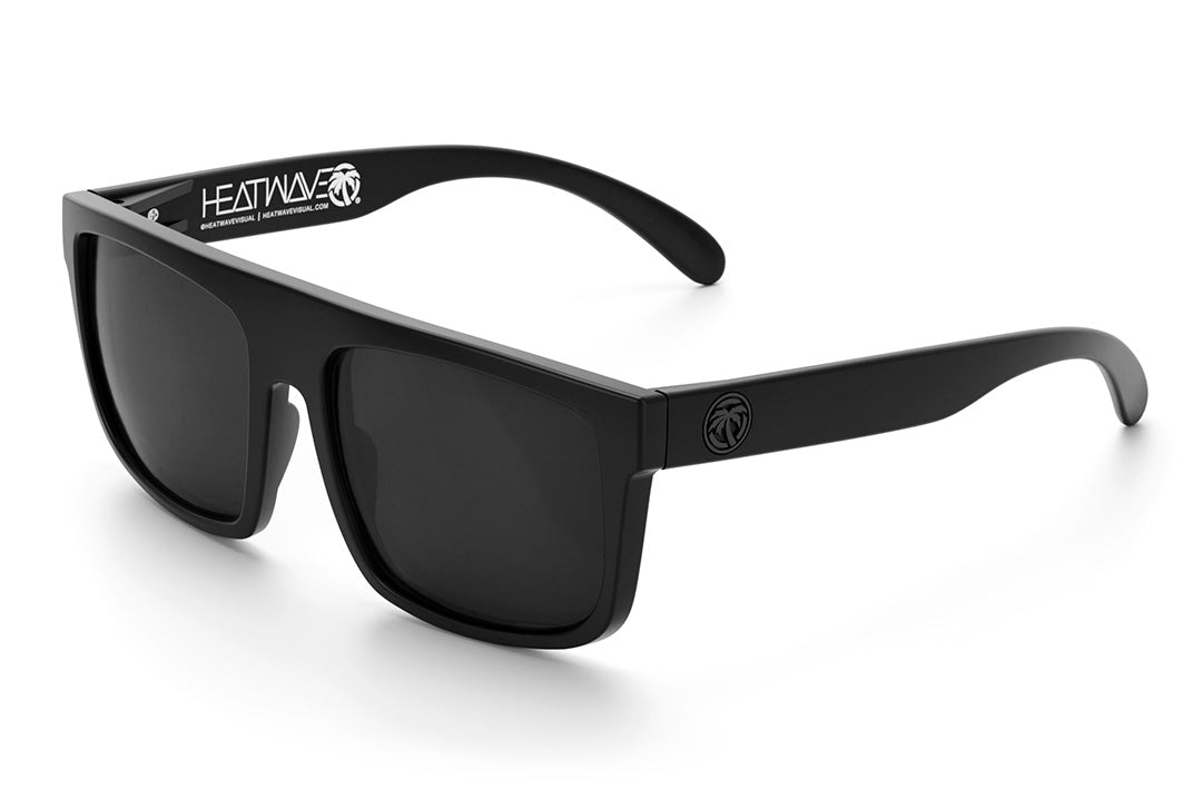 Heat Wave Visual Regulator Sunglasses with black frame, black arm emblems and black lenses.