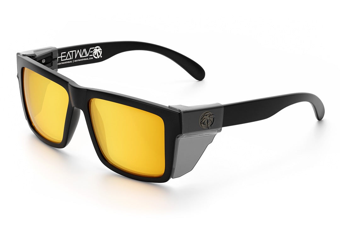 Heat Wave Visual Vise Z87 Sunglasses with black frame, gold lenses and smoke side shields.