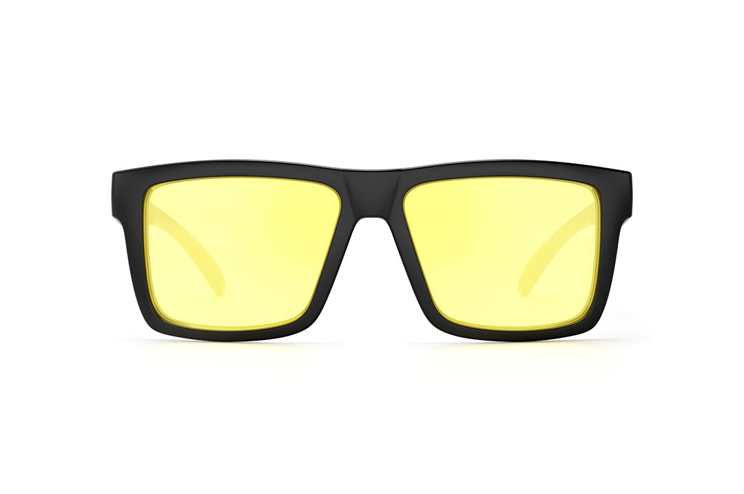 Front of Heat Wave Visual Vise Sunglasses with black frame, hi-vis yellow lenses and extra set of clear lenses. 