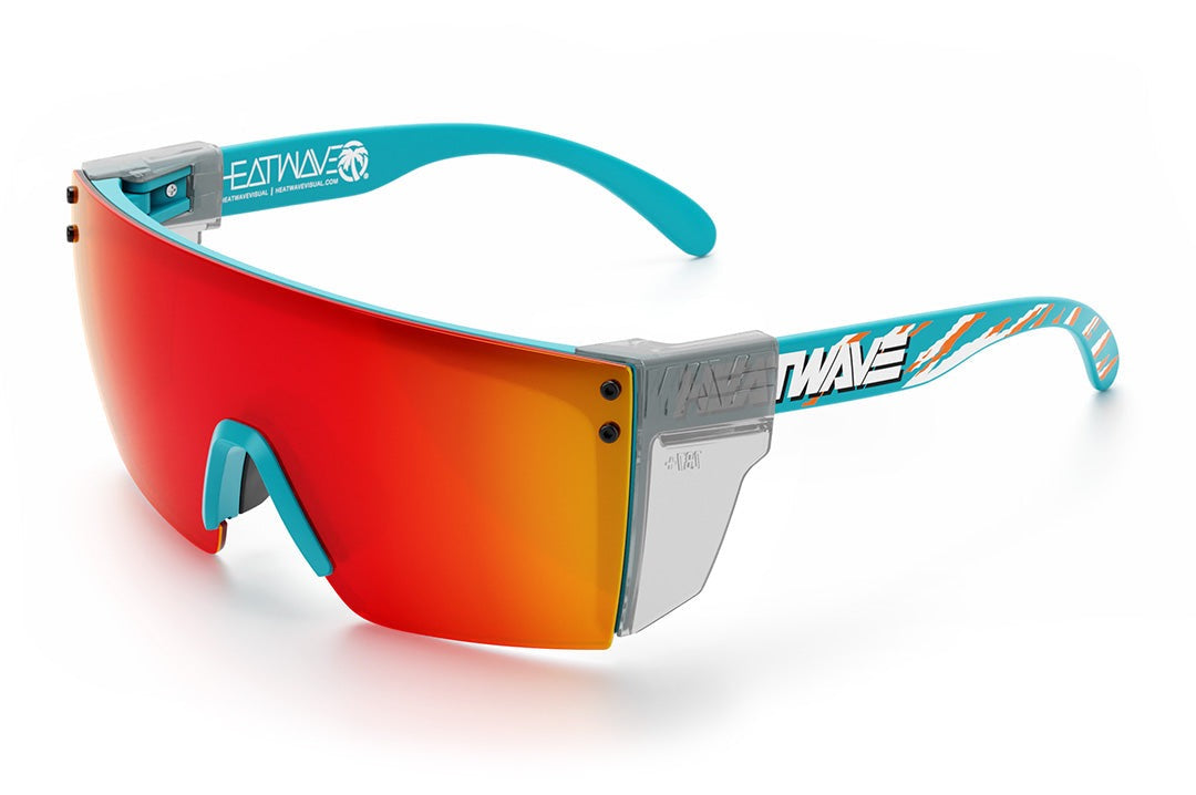Heat Wave Visual Lazer Face Sunglasses with teal frame, bolt smoker print arms, sunblast orange yellow lens and clear side shields.