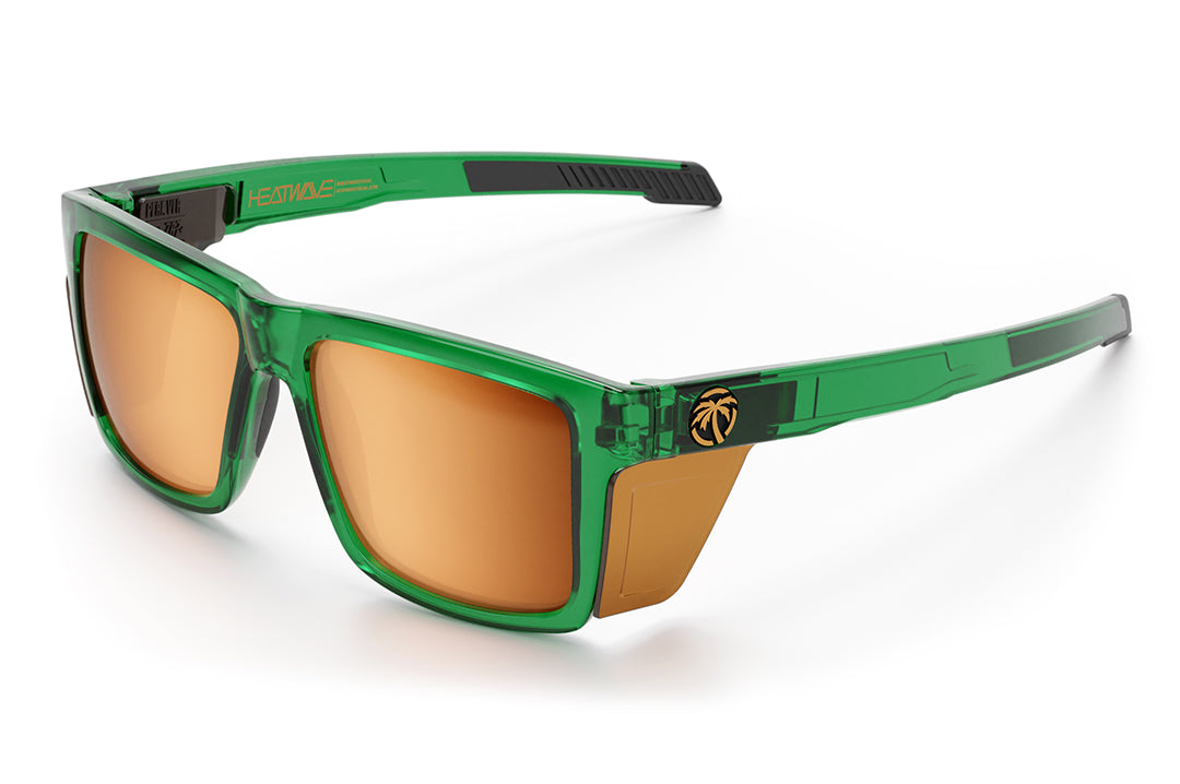 3/4th angle shot of the Performance Vise Sunglasses: Cycad Green Z87+ with side shields on a white background.