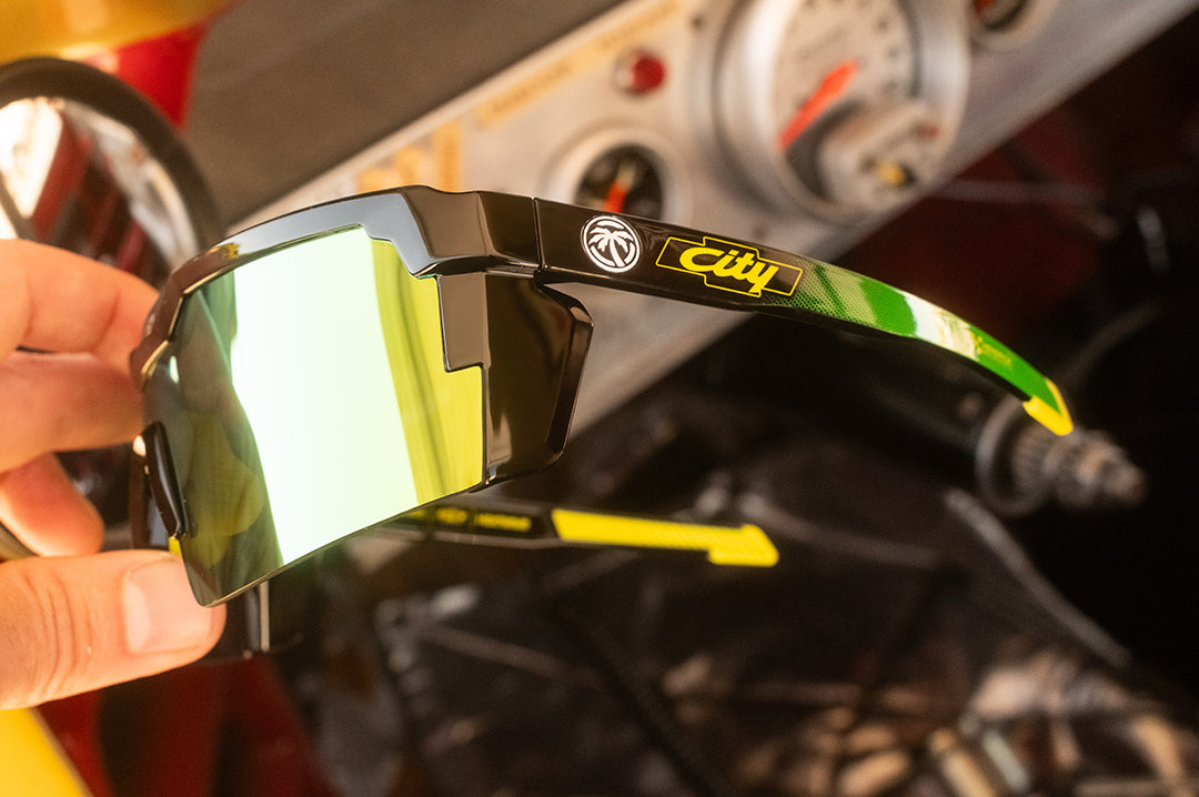 Someone holding the City of Chevrolet X HWV Future Tech Sunglasses.