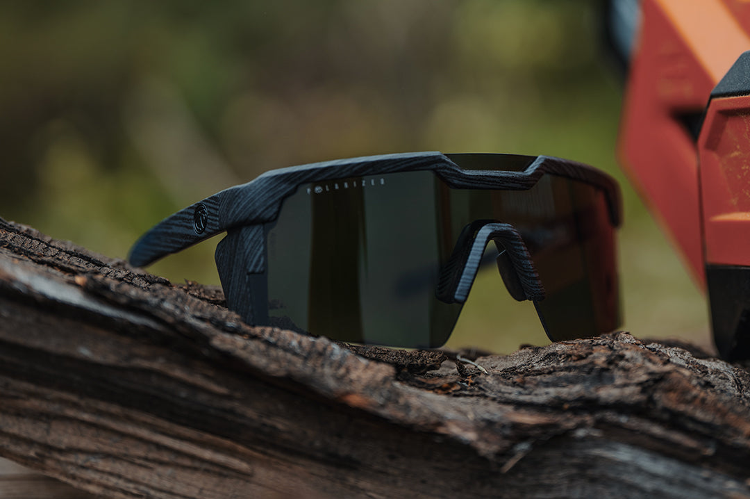 The Future Tech Sunglasses: Deadwood Z87+ placed on a tree