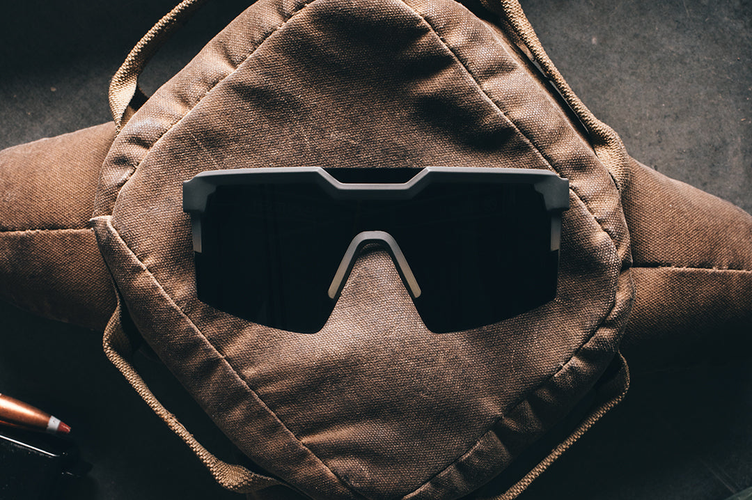 Front side of the Future Tech Sunglasses: FDE Fader Z87+ on a brown bag