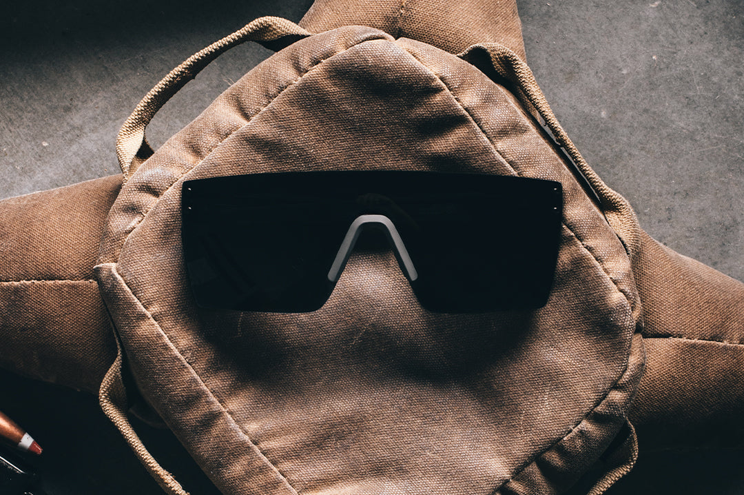 Front side of the Performance Lazer SLIM Sunglasses: FDE Fader Z87+ on a bag