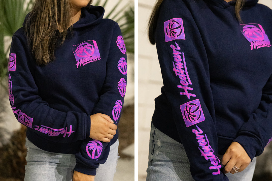 Young lady wearing the Heat Wave Visual TV Ladies Navy Sweatshirt. 
