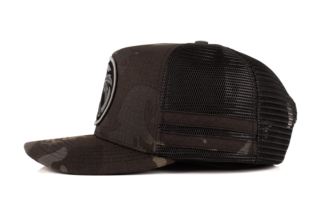 Side view of the Heat Wave Visual Icon Multicam Trucker Hat.