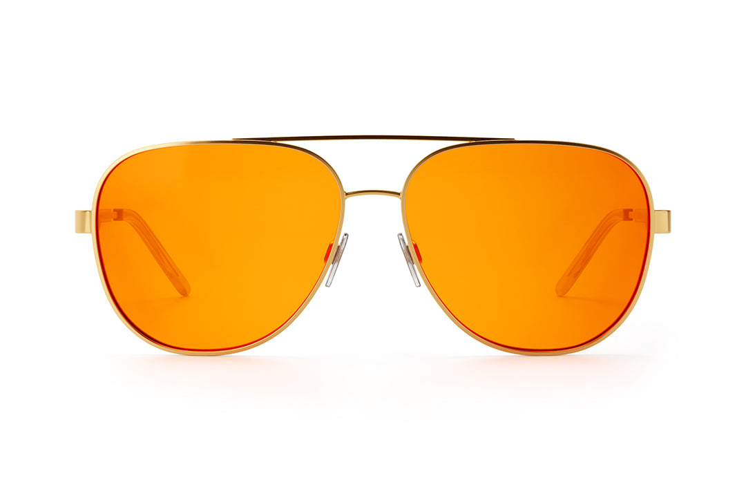 Heat Wave Visual Incline Sunglasses with polished gold frame and amber lenses.