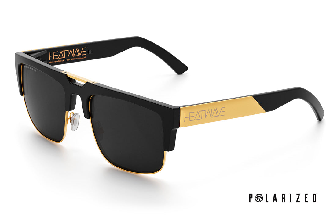 Heat Wave Visual Interceptor Sunglasses with black gold frame and polarized black lenses.