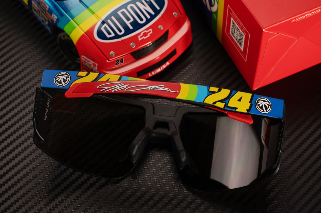 Close up of the Heat Wave Visual Vector Sunglasses with black frame, Jeff Gordon 24 print arms and galaxy blue lens.