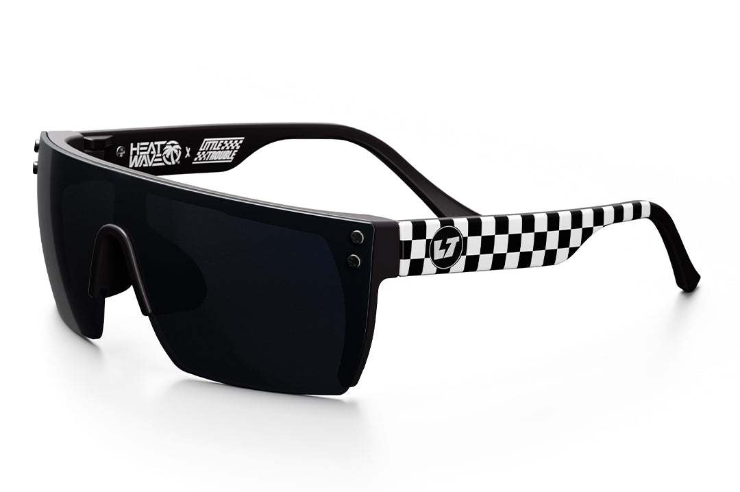 3/4 angle view of the Kids Lazer Face Sunglasses: Little Trouble X Heat Wave Checkered Flag with black lens on a white background.