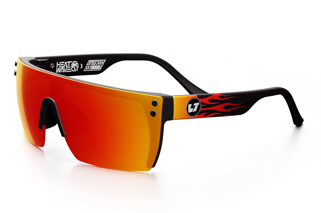 3/4 angle shot of the Kids Lazer Face Sunglasses: Little Trouble X Heat Wave Flames with red-orange gradient lens on a white background.