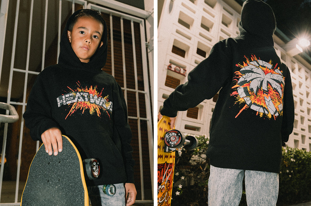 Kid rocking the  Heat Wave Visual Explosion Sweatshirt in black. 